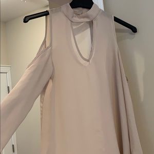 Top. Shoulder less. V in front and back.